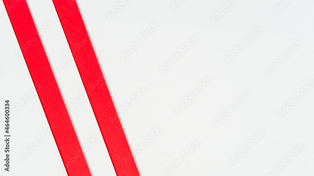 Abstract background with red and white paper sheets, excellent for use as a design element or as inspiration for website cover ideas.