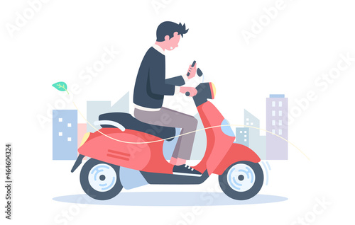 Young Man Using Smartphone While Riding a Scooter