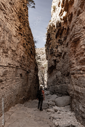 Hiker Stops to Look Admire The Devils Hall Canyon