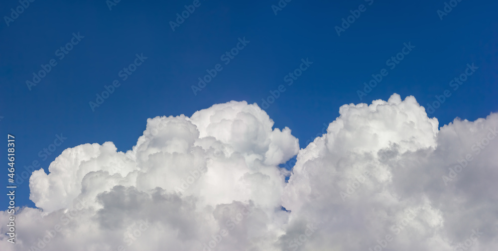 Blue skies with textured white clouds. A beautiful, atmospheric photograph. Blue skies with textured white clouds. A beautiful, atmospheric photograph.