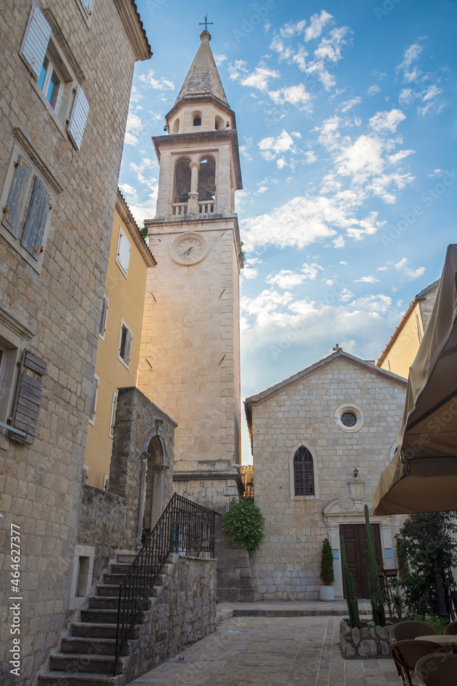 Fototapeta premium Belfry of Saint John Church symbol of Budva. Church Saint John, with images and icons of Venetian one of most famous churches in Budva. Budva, Montenegro, Europe.