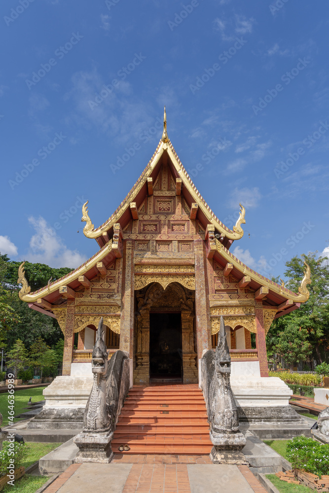 Beautiful front view of historic viharn Lai Kham inside compound of famous landmark Wat Phra Singh buddhist temple, Chiang Mai, Thailand