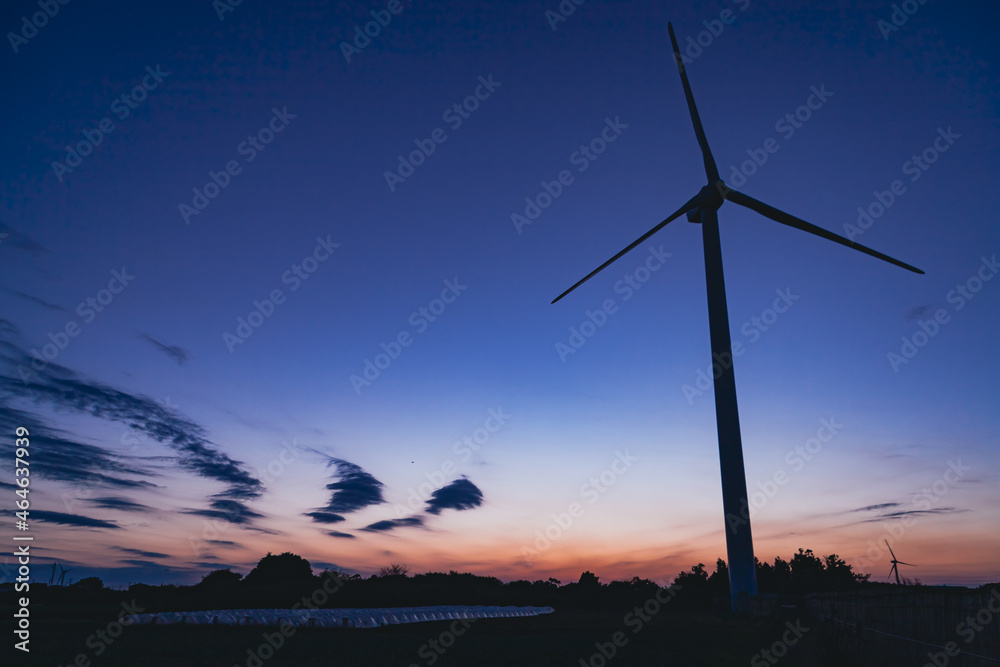 Obraz premium Wind power generation installed in a field in Chiba prefecture