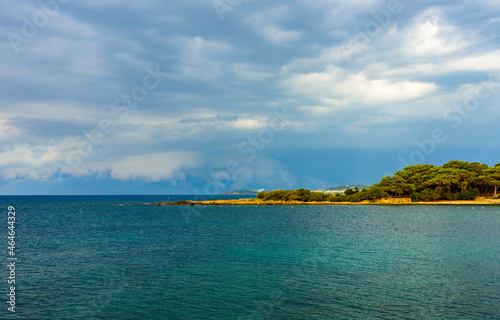  beautiful view of an empty beach with storm clouds before a thunderstorm on the Mediterranean coast in Turkey, Avsalar