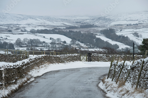 a road cleared of snow in the Yorkshire dales © richjem