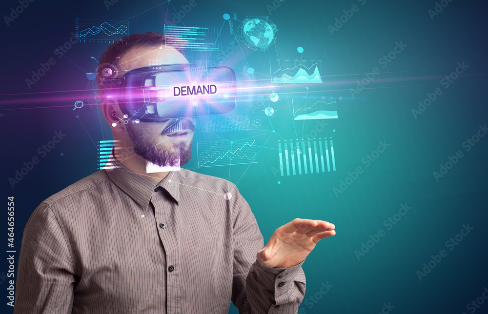 Businessman looking through Virtual Reality glasses Businessman looking through Virtual Reality glasses