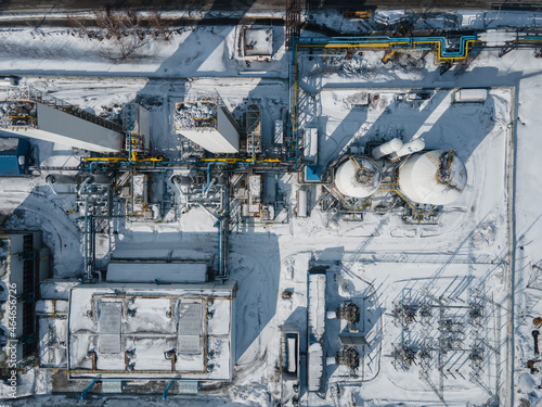 Close-up of oil and gas refineries zone, Steel pipeline equipment detail. air pollution. fly a drone