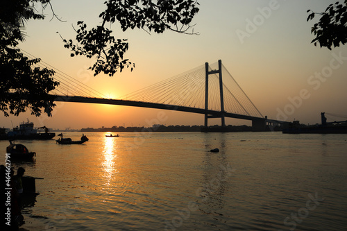 sunset over the river Ganga or Ganges in kolkata photo