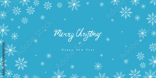 Christmas horizontal background with snowflakes on a blue layer. The inscription Merry Christmas. vector banner
