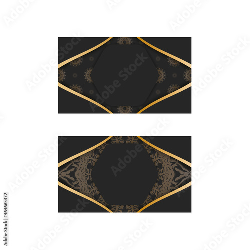 Business card in black color with mandala gold pattern for your contacts.