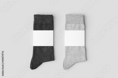 Light and dark grey socks mockup with blank label. photo