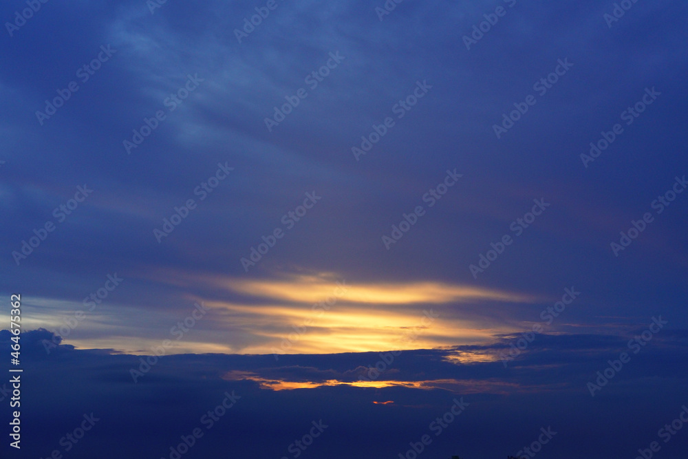 Fototapeta premium Sunset sky with dramatic clouds and beautiful dark blue cloud