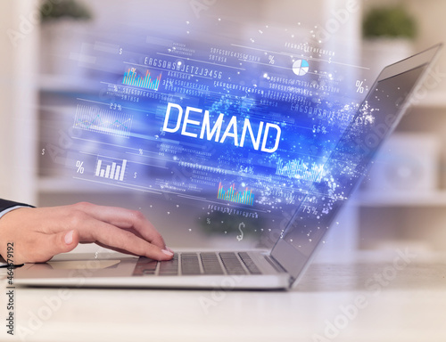 Closeup of businessman hands working on laptop