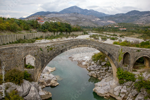 famous stone bridge called Ura e mesit, near Shkodra, albania in the north photo