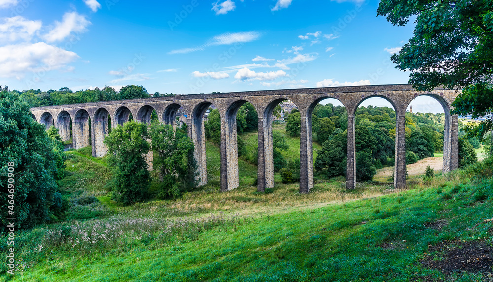 A panorama view of the Thornton viaduct crossing the Pinch Beck next to the town of Thornton, Yorkshire, UK in summertime