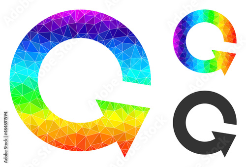 Low-poly rotate ccw icon with spectrum vibrant. Spectrum vibrant polygonal rotate ccw vector is designed with random colored triangles. photo