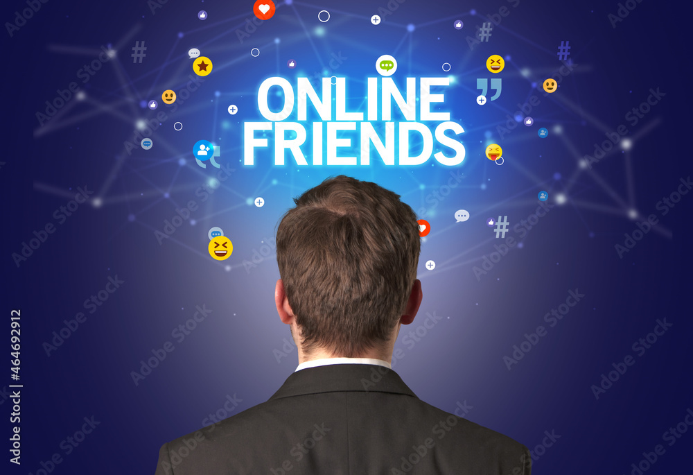Rear view of a businessman, social media concept Rear view of a businessman, social media concept