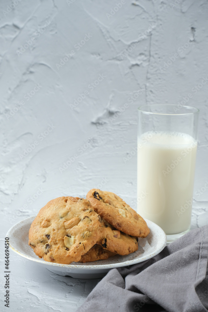 Glass of milk and cookies with white background Glass of milk and cookies with white background
