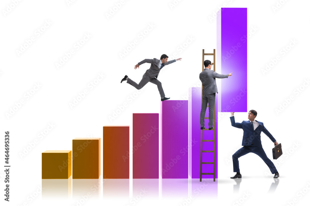 Businessman supporting economic growth on chart Businessman supporting economic growth on chart