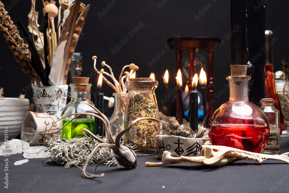 Witchcraft still life with black burning candles selective focus ...