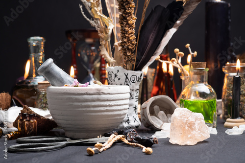 Photo Mortar and pestle witchcraft alchemy still life selective focus, witch craft pharmacy and medicine