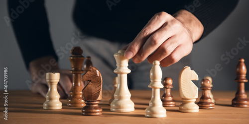 Business concept, the man playing chess