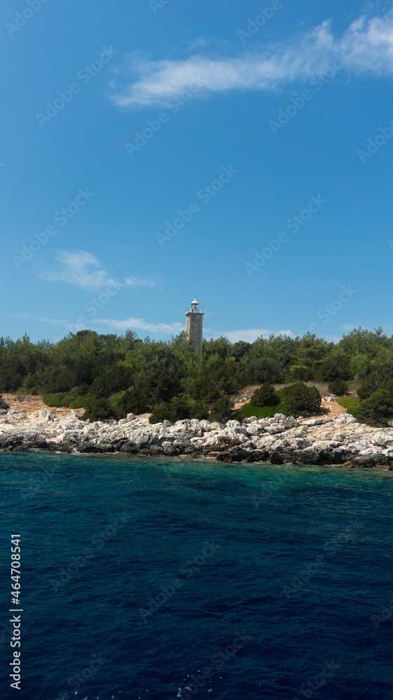Rocky seashore with a lighthouse