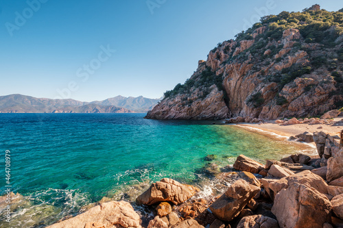 The small secluded beach of Ficaghiola and turquoise Mediterranean sea on the west coast of Corsica