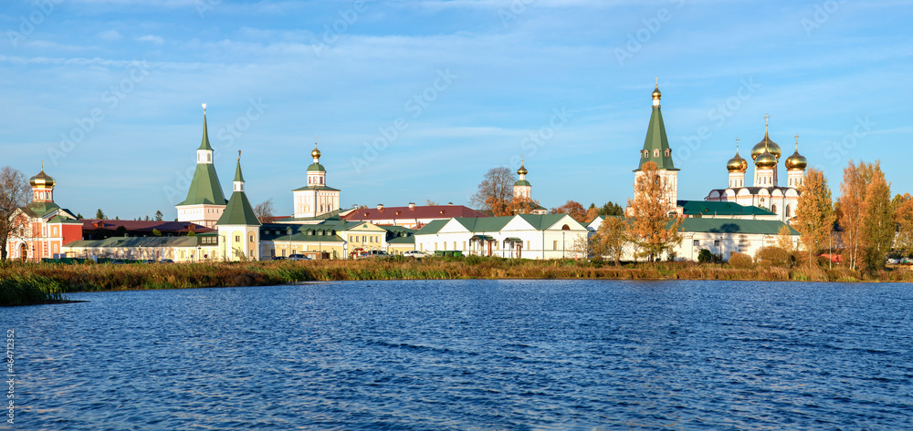 Panorama of the Iversky Svyatoozersky Monastery in the autumn evening. Valdai, Novgorod region. Russia