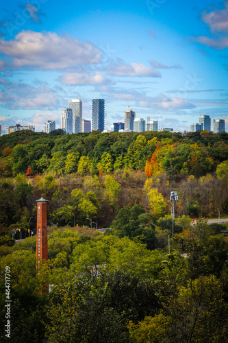 Photography Toronto Don Valley with lush green urban forest, skyscrapers and Todmorden Mills