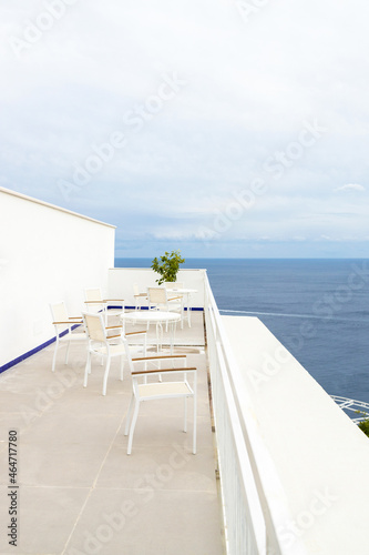 Restaurant terrace on roof with sea view.