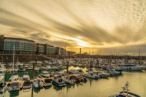 Sunset over marina, Saint Helier, bailiwick of Jersey, Channel Islands © vadim.nefedov