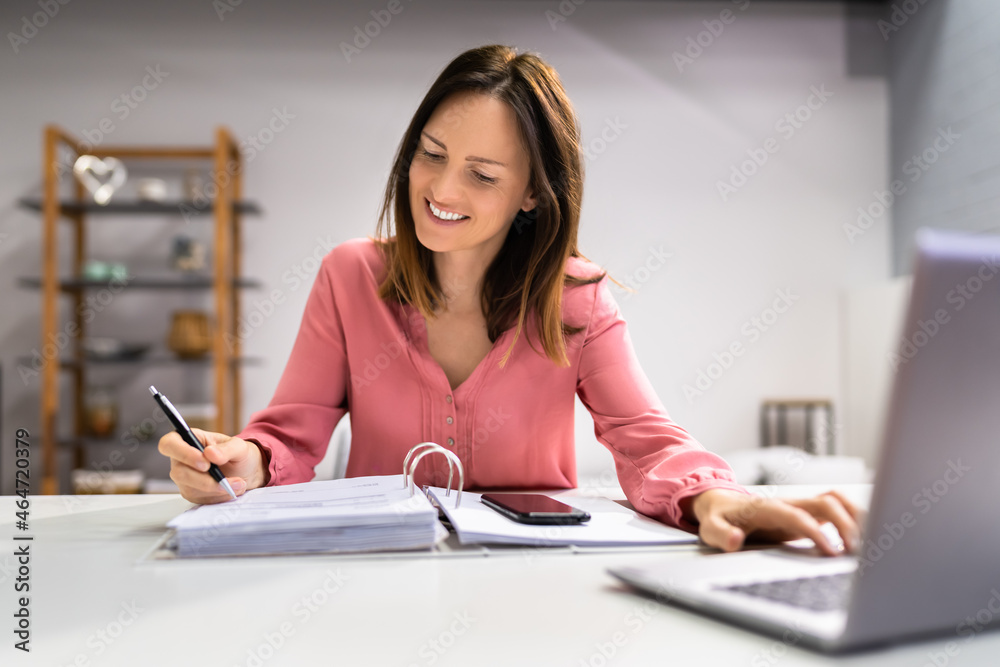 Female Doing Taxes And Accounting Female Doing Taxes And Accounting