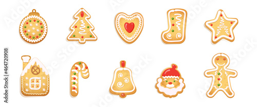 Set of gingerbread Christmas cookies decorated with sugar glaze. Vector illustration of festive cookies in the shape of a man, a star, a Christmas tree, a bell, candy, a Christmas tree decoration