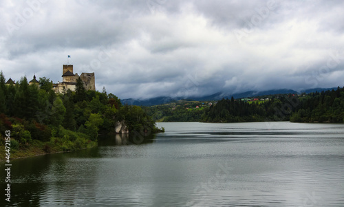 Haunted castle with dramatic background and clouds. Niedzica-Poland.