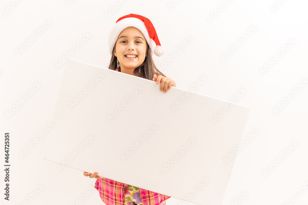 Christmas girl standing with empty horizontal blank in hands, above view, isolated on white Christmas girl standing with empty horizontal blank in hands, above view, isolated on white