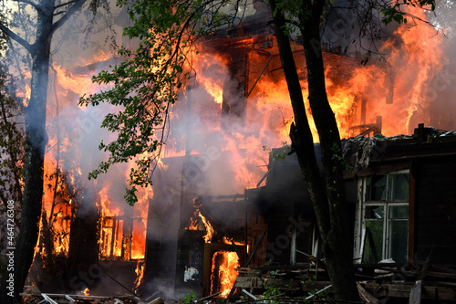 Walking down the street, I saw an old abandoned house in which a fire had started. Later firefighters arrived and started extinguishing it. But it was too late. The house burned to the ground.