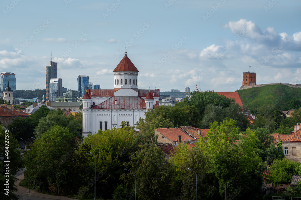 Orthodox Cathedral of the Theotokos with Gediminas Castle Tower on background - Vilnius, Lithuania