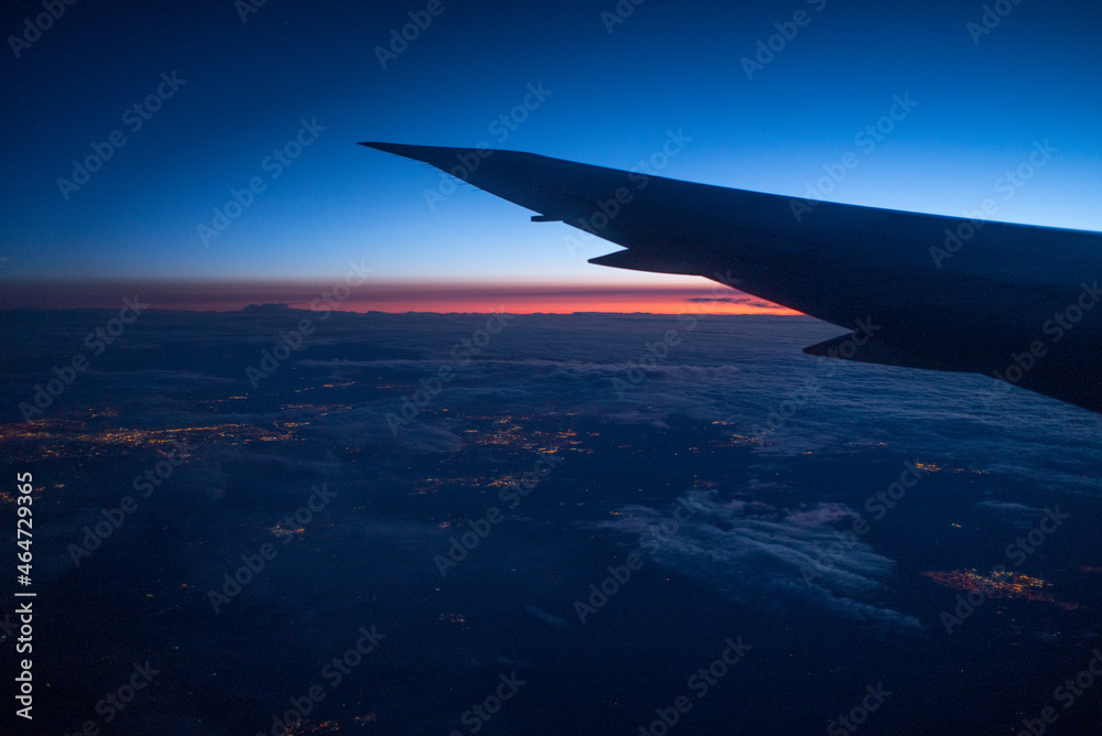 View of sunrise over England from airplane View of sunrise over England from airplane