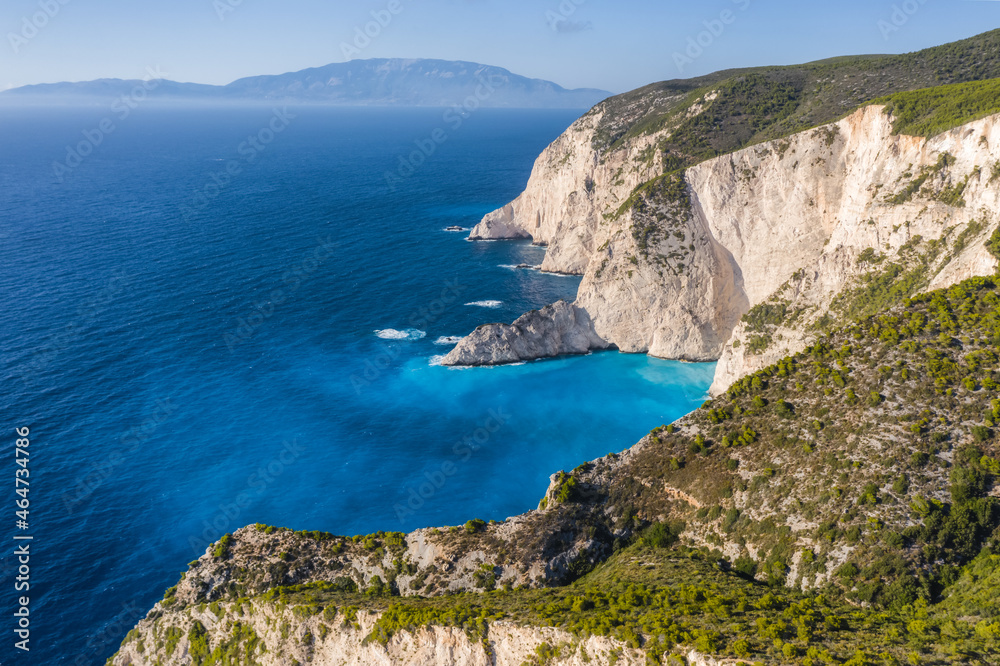 Aerial view of limestone cliffs close to Navagio or Shipwreck Beach on Zakynthos Island, Greece. Summer vacation travel concept