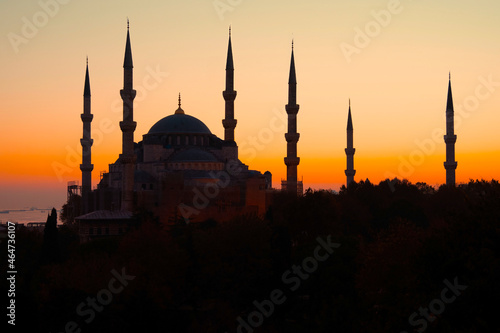 Blue mosque in Istanbul during yellow sunset. Blue Mosque or Sultanahmet Camii and minarets against bright yellow sky