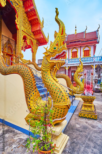 The Naga serpents of Wat Chai Mongkhon Temple, Lamphun, Thailand photo