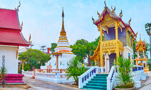 The buildings on grounds of Wat Sangkharam Temple, Lamphun, Thailand photo