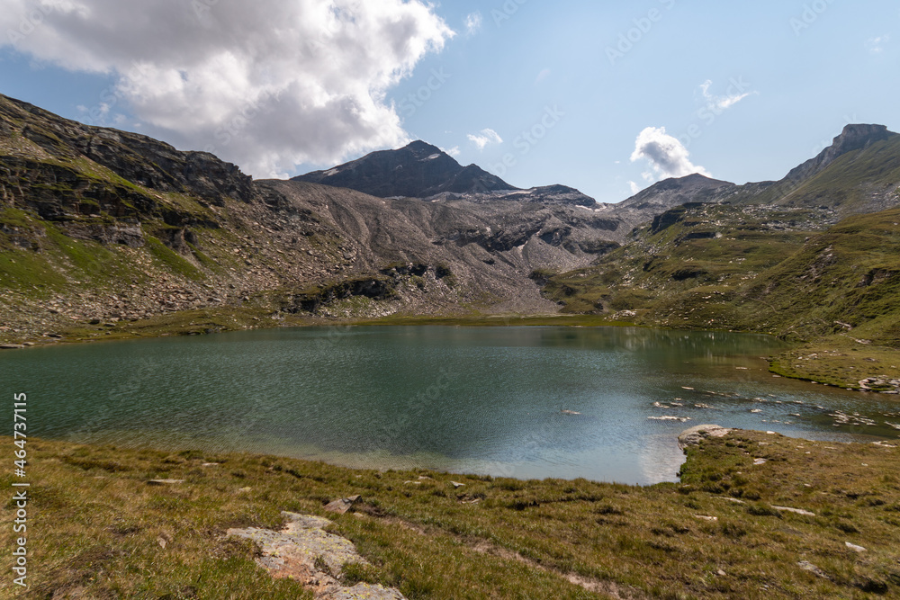 Vals, Switzerland, August 21, 2021 Alpine lake in front of the mount Fanellhorn