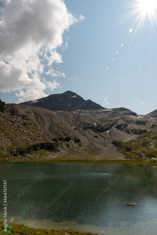 Vals, Switzerland, August 21, 2021 Alpine lake in front of the mount Fanellhorn