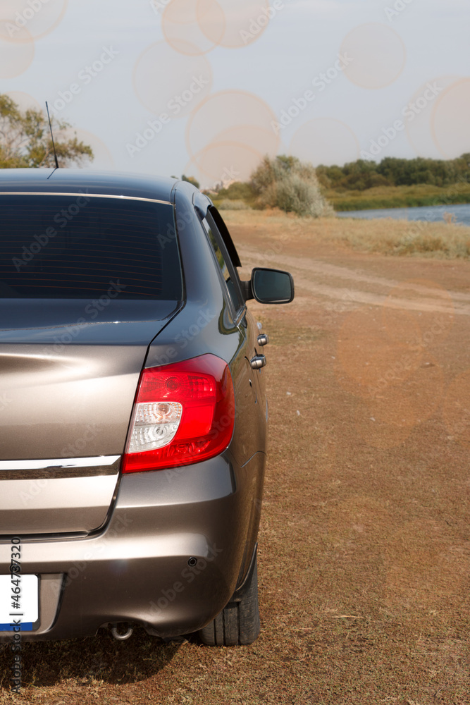 rear headlight of a car in nature, a vehicle lighting element