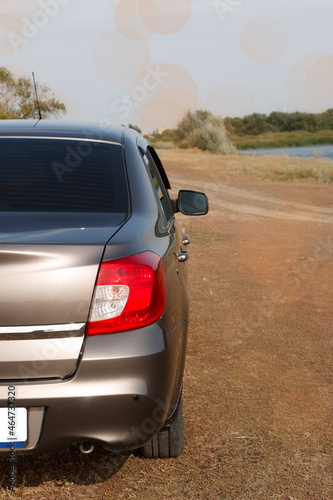 rear headlight of a car in nature  a vehicle lighting element