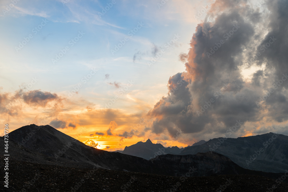 Vals, Switzerland, August 21, 2021 Burning sky after sunset at the mount Fanellhorn