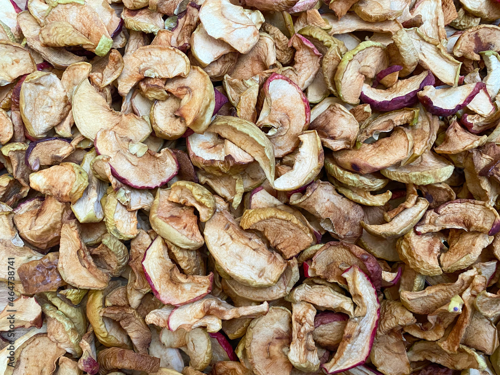 Background of dried apples in close-up. Texture of dried apples Background of dried apples in close-up. Texture of dried apples