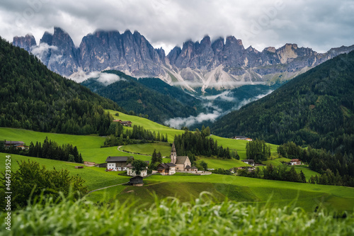 St Magdalena church in Val di Funes valley, Dolomites, Italy. Furchetta and Sass Rigais mountain peaks in background © Igor Tichonow